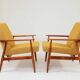 Pair of vintage boucle mustard armchairs H.Lis