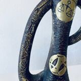 Brutalist bronze vase, the signs of the zodiac