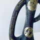 Brutalist bronze vase, the signs of the zodiac