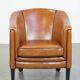 Sheep leather club chair finished with black piping