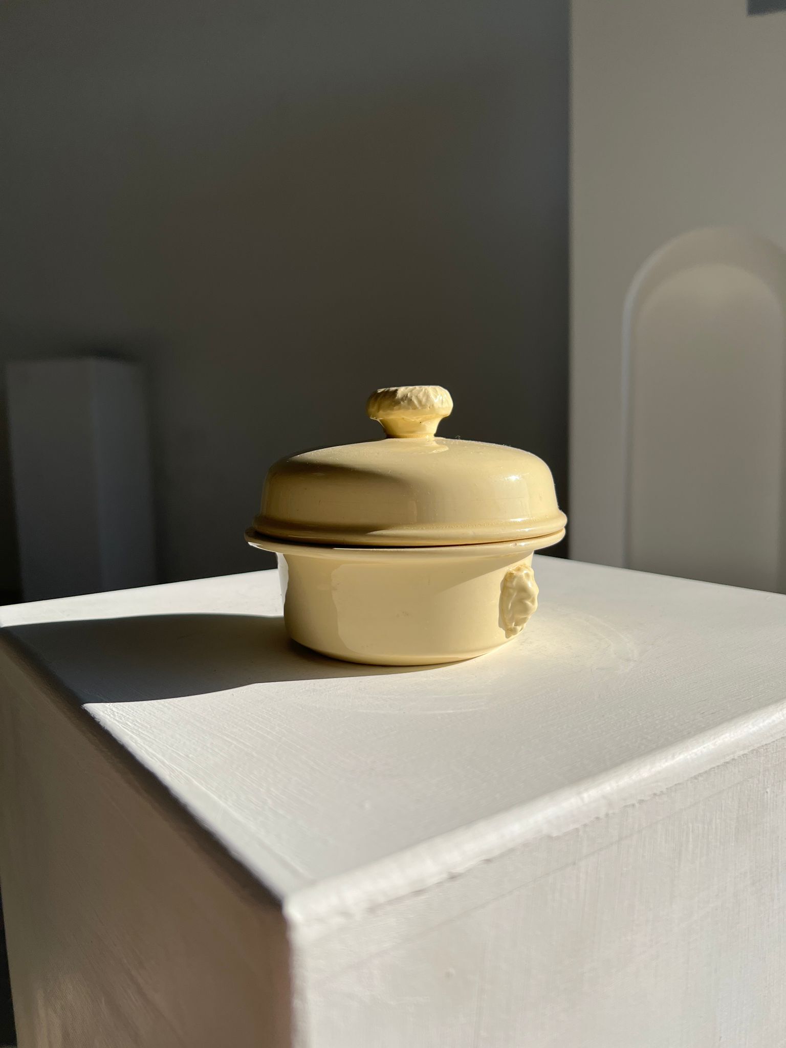 Glazed light yellow ceramic terrine