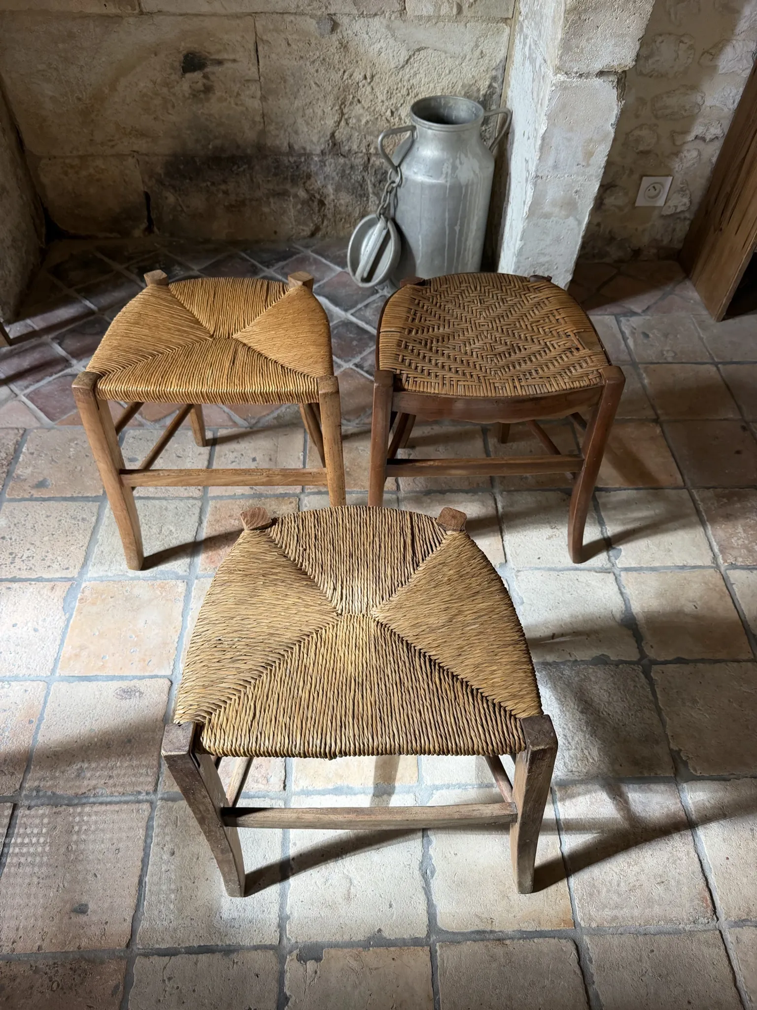 Campaign stool in rattan and wood