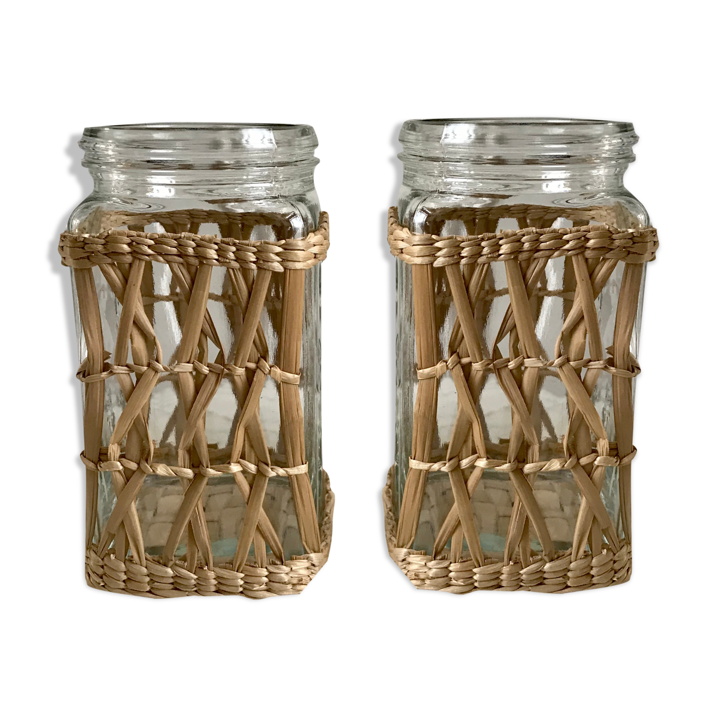 Duo of glass jars surrounded by vintage bamboo