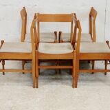 5 chaises en bois piètement fuselé circa 1975