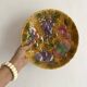 Round dish in barbotine with sarregumine fruit decoration