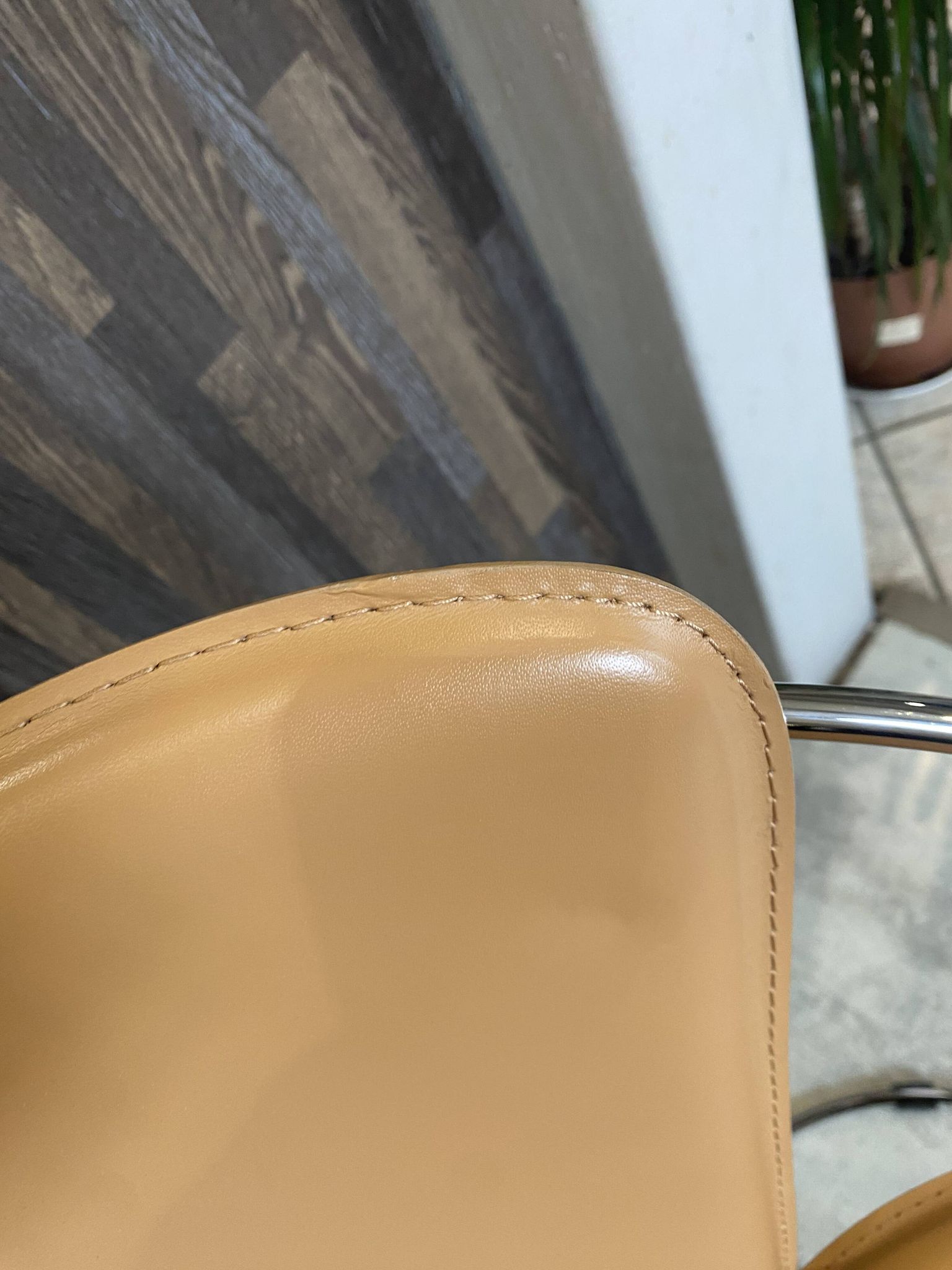 1 Linda armchair chair by Arrben in camel brown leather with a chrome steel frame.
