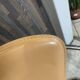 1 Linda armchair chair by Arrben in camel brown leather with a chrome steel frame.
