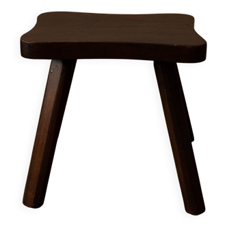 Vintage wooden stool in organic shape
