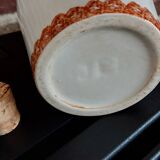Old earthenware brandy bottle