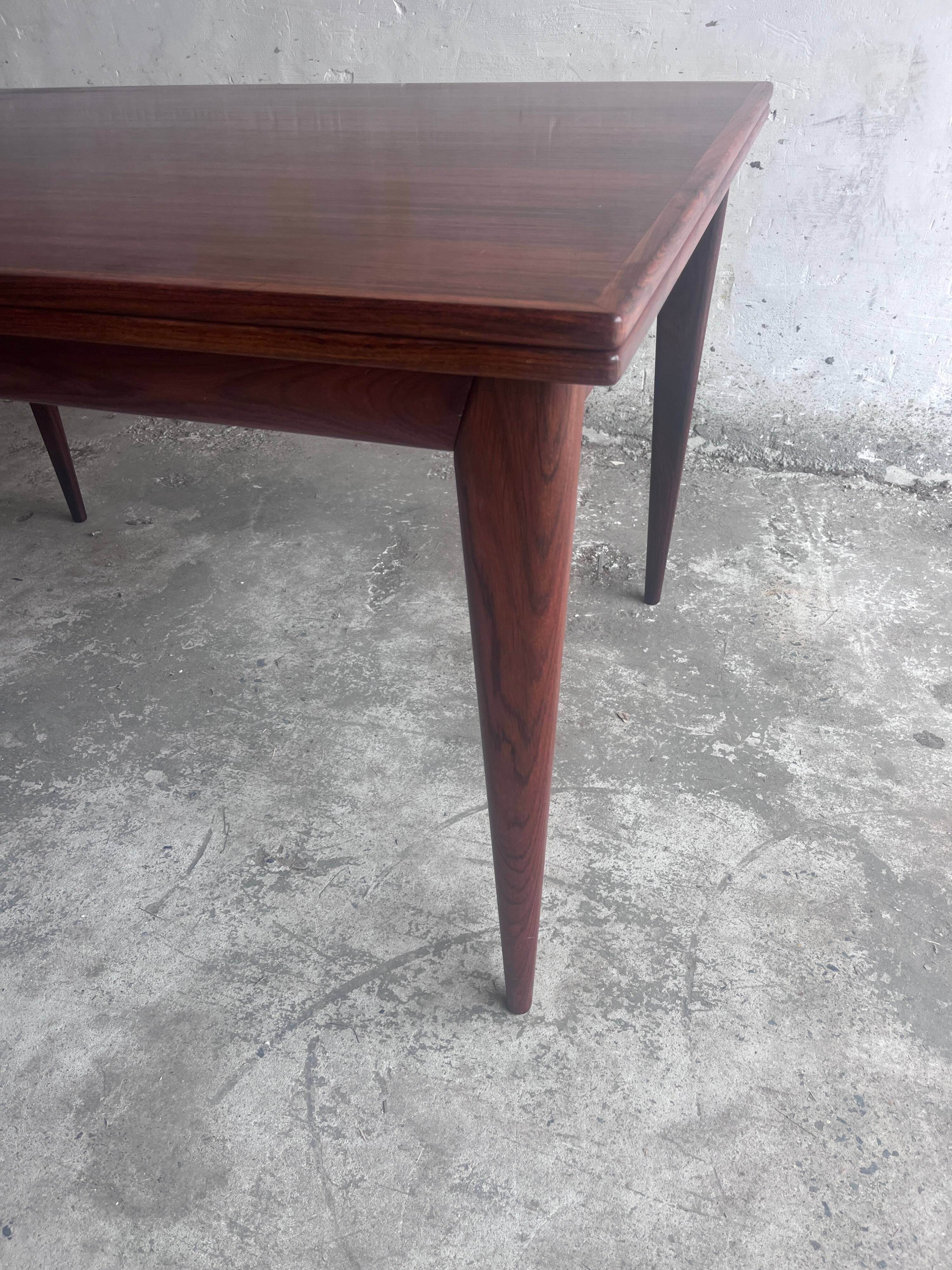 Danish extendable dining table in rosewood by Niels O. Møller, model 254, Denmark, 1960s.