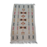 White kilim carpet with multicolored Berber patterns