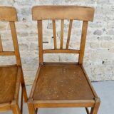 Pair of bistro chairs with perforated seat