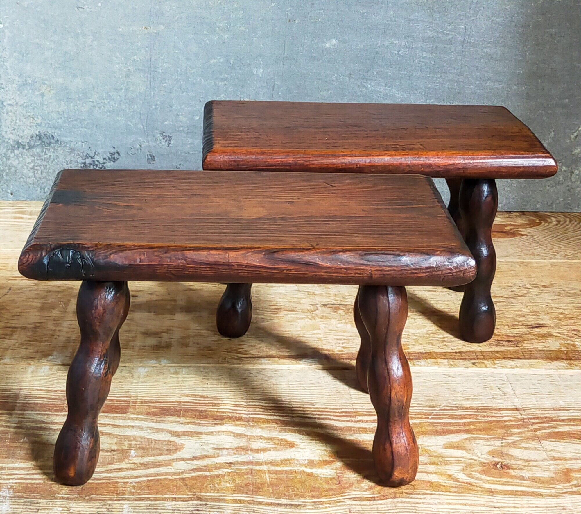 Pair of vintage solid turned wood footstools
