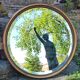 Old beveled round mirror