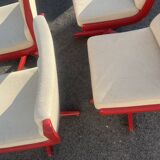 Set of 4 vintage 1970s swivel chairs in red and beige.