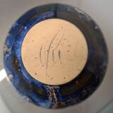 Blue ceramic Single flower vase in a round shape