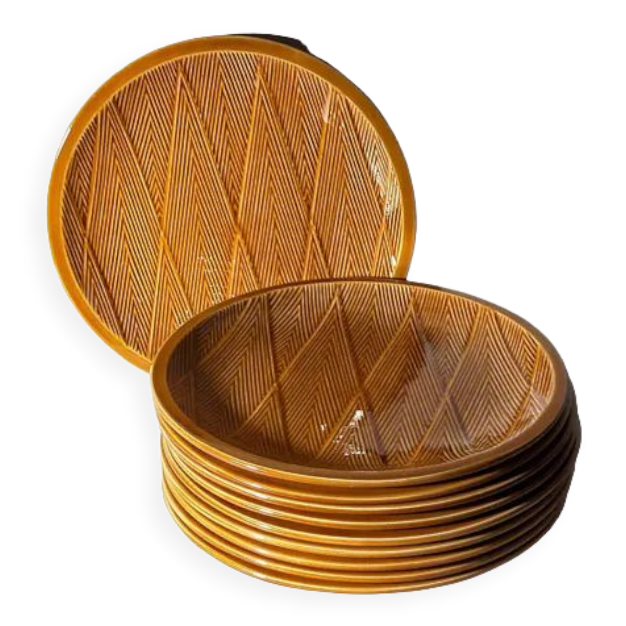 Ten plates in Salins slip with braided patterns 50s