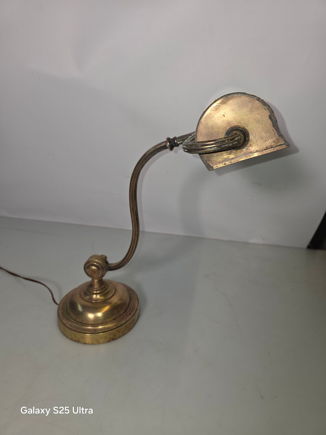 Antique brass desk lamp from a notary.