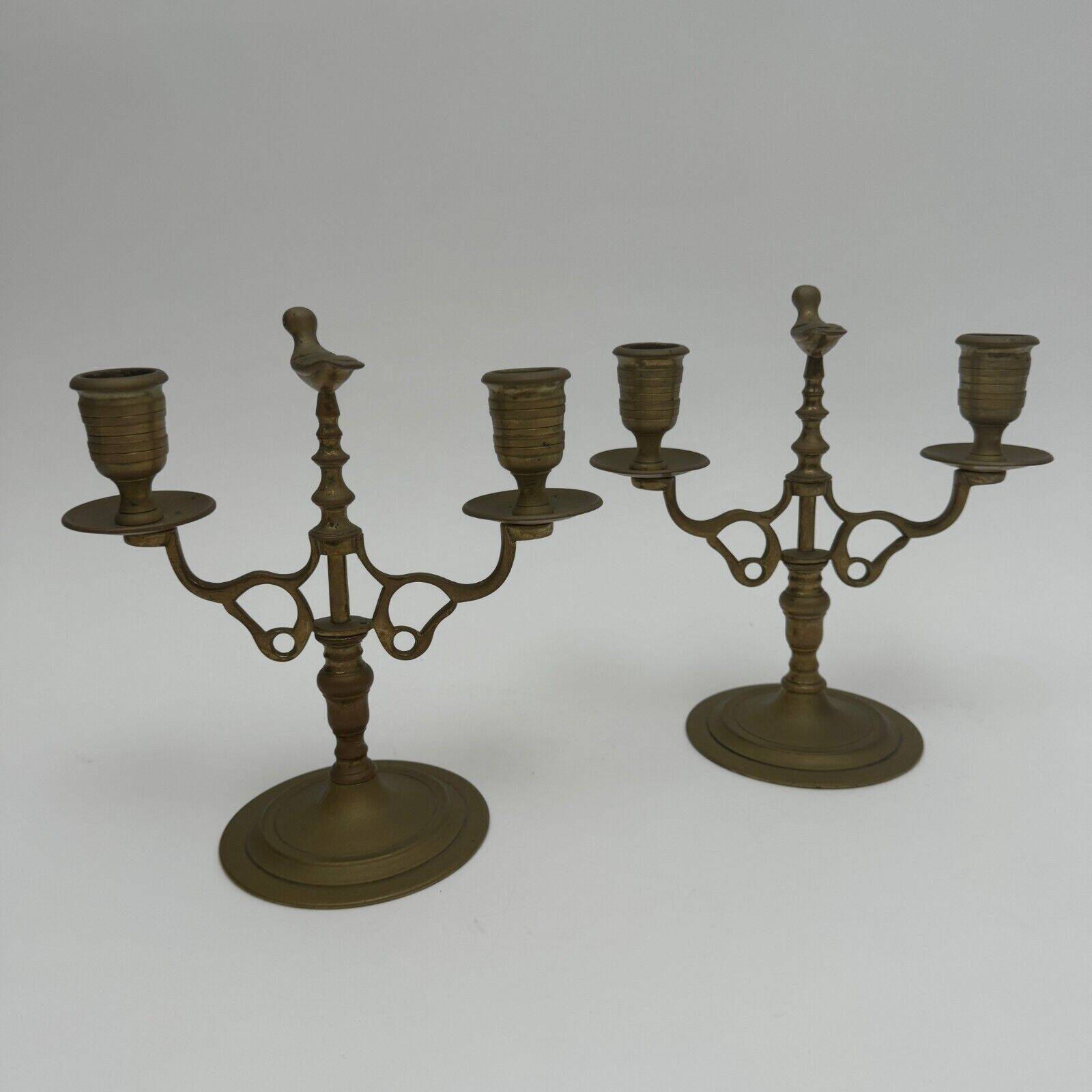 Pair of 19th century bronze candlesticks with bird decor, 2 lights
