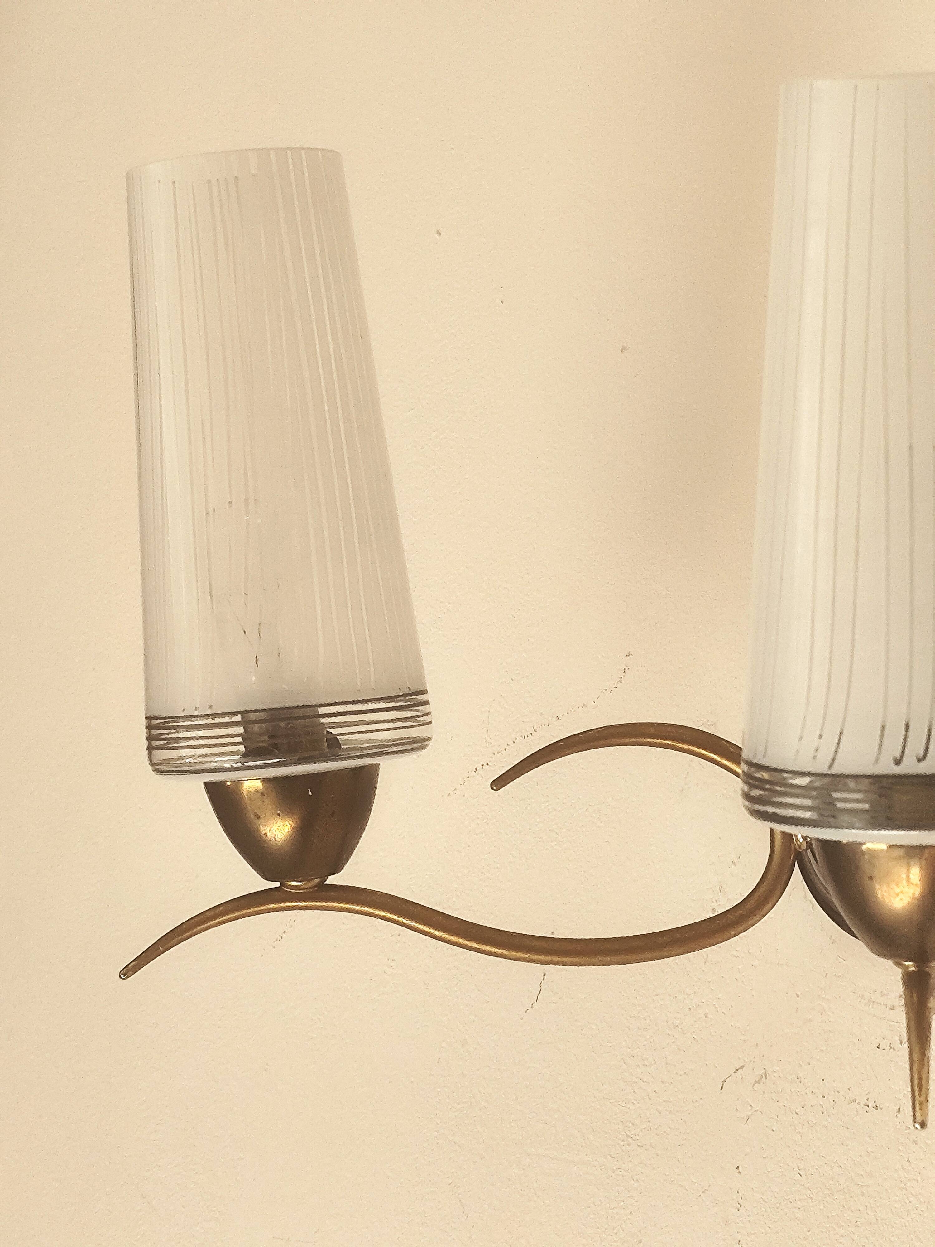Two-light wall sconce in gilded metal with opaque glass shades, 1950/1960