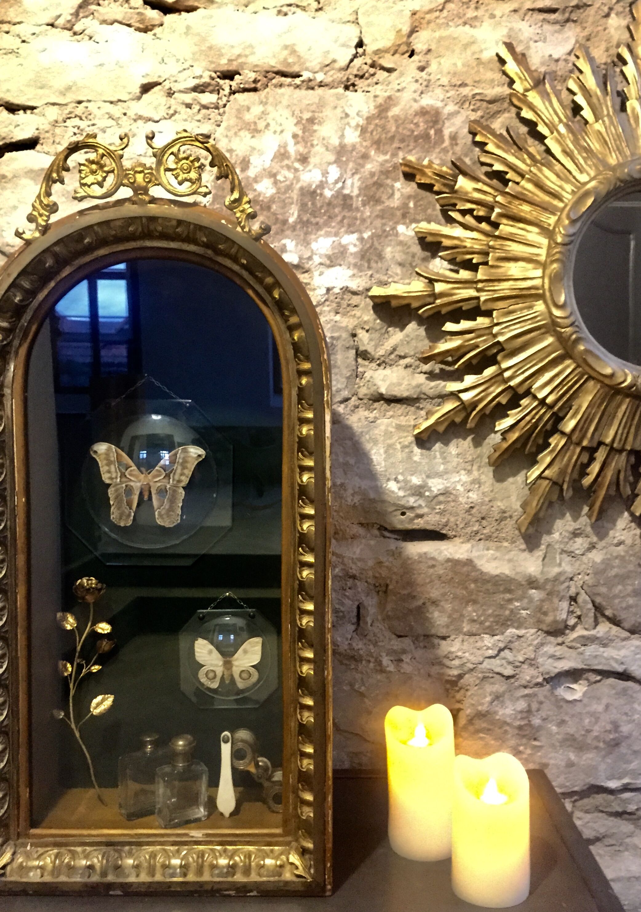 Old wood display and brass ornaments