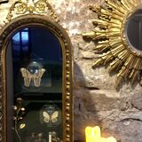 Old wood display and brass ornaments