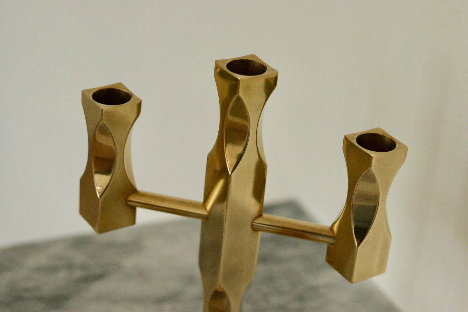 Swedish three-armed candelabrum in brass by Lars Åkesson for Vallonmässing