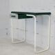 Tubular steel console, black glass tray, circa 1950