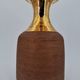 Vase in raw chamotte sandstone enameled with gold, Italy, Bitossi for Raymor, circa 1960/1970