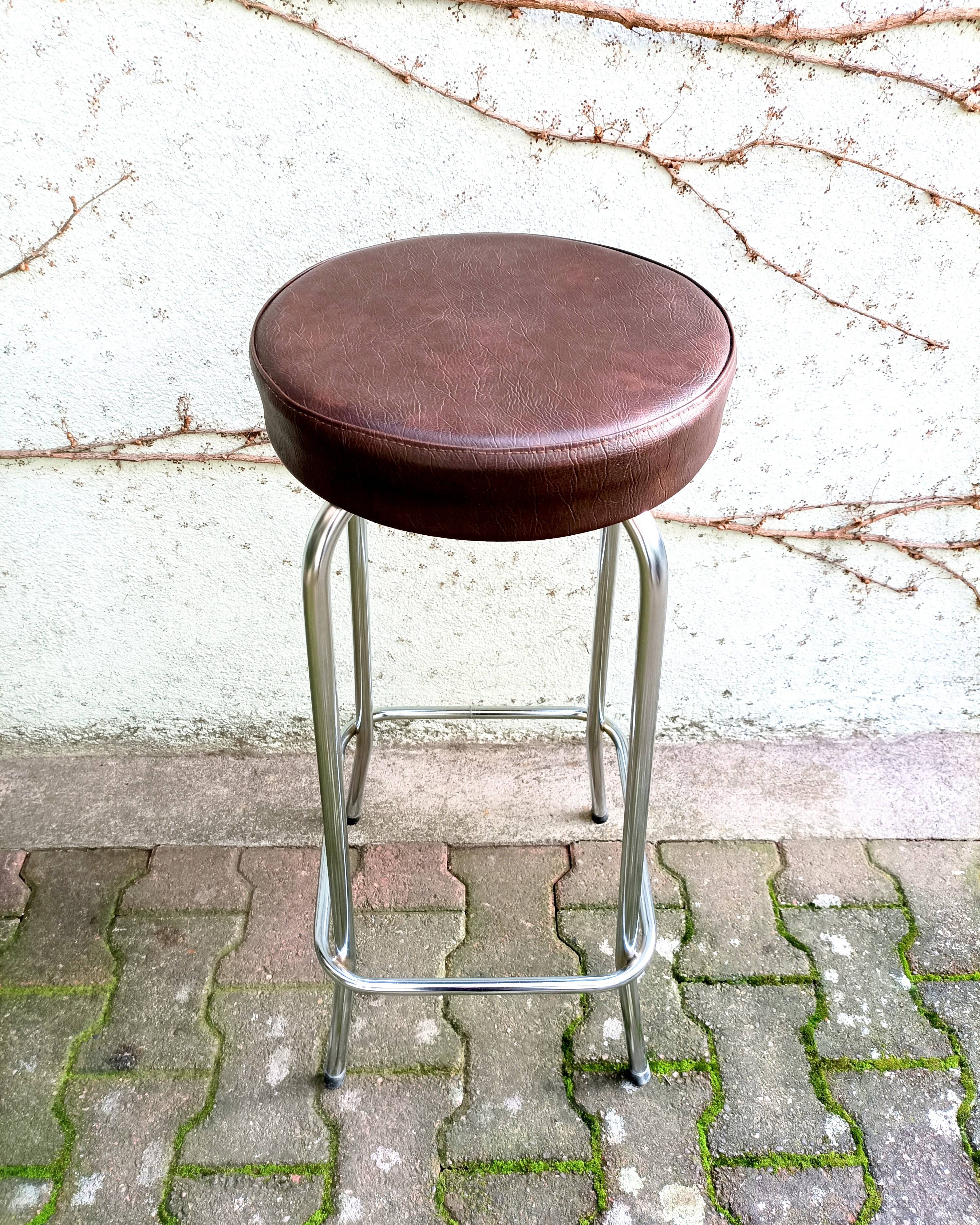 Metal and faux leather bar stool