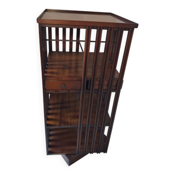 Rotating bookshelf on a base