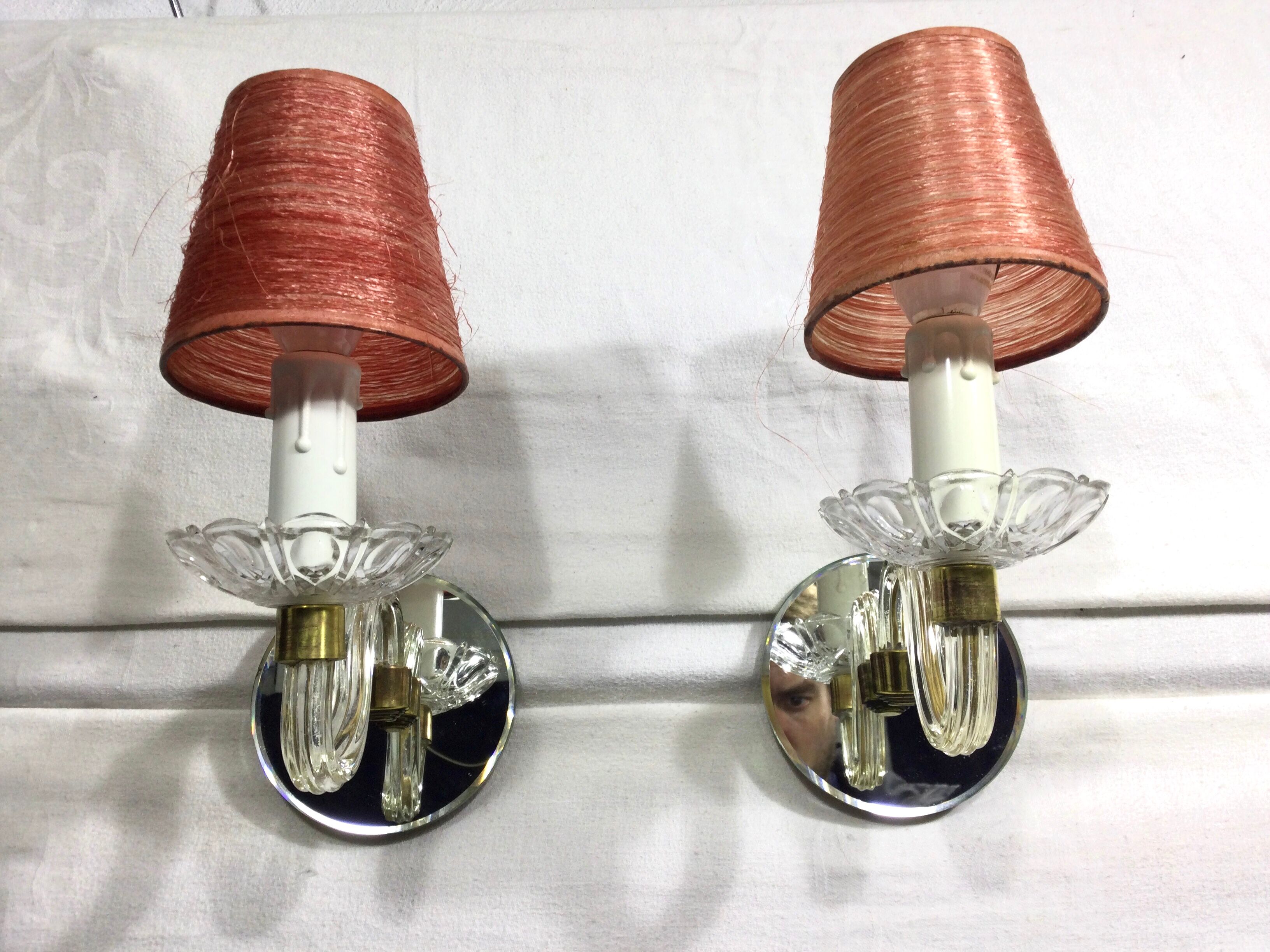 Pair of glass and mirror sconces