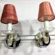 Pair of glass and mirror sconces