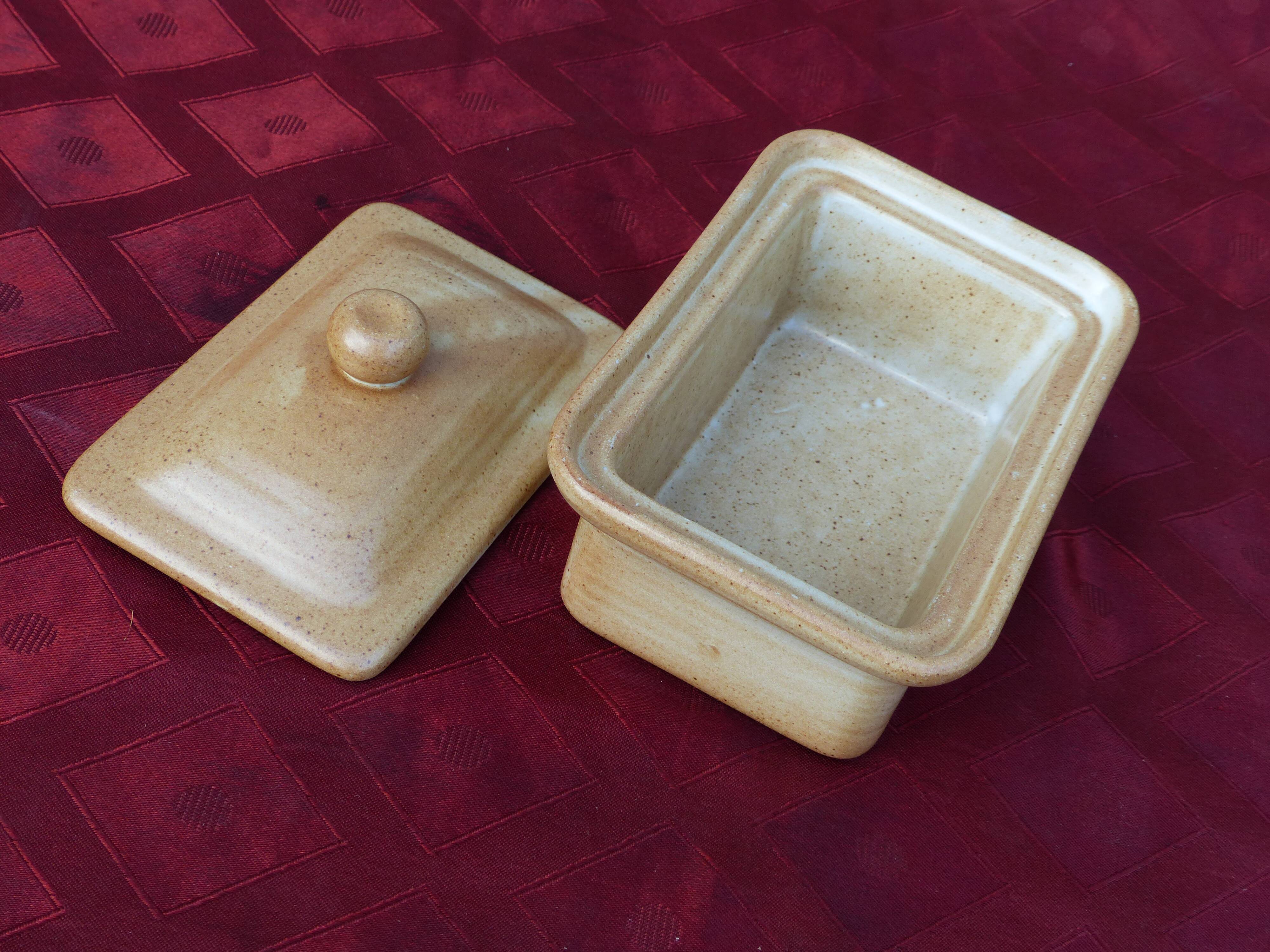 Butter maker in "sandstone village france"