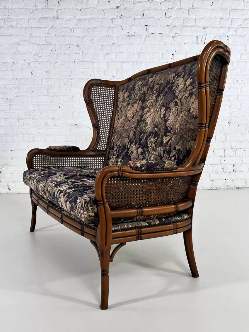 Wingback 2-seater sofa in carved wood, cane and fabric