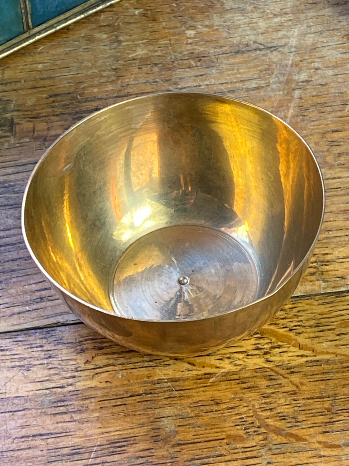 Bonbonnière, in the shape of an apple, made of brass.