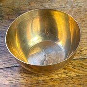 Bonbonnière, in the shape of an apple, made of brass.