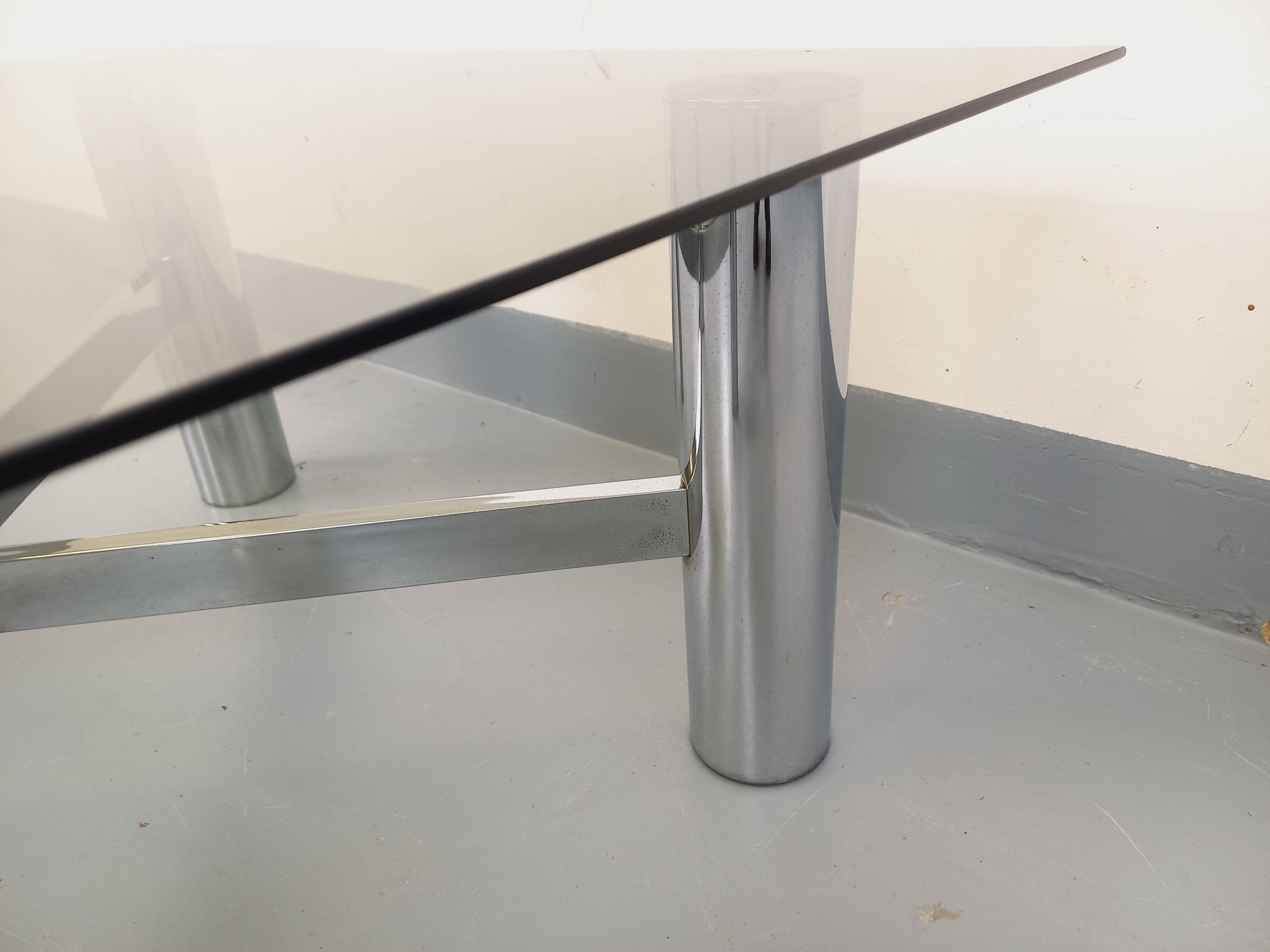 Square Italian vintage Space Age coffee table in smoked glass and metal.