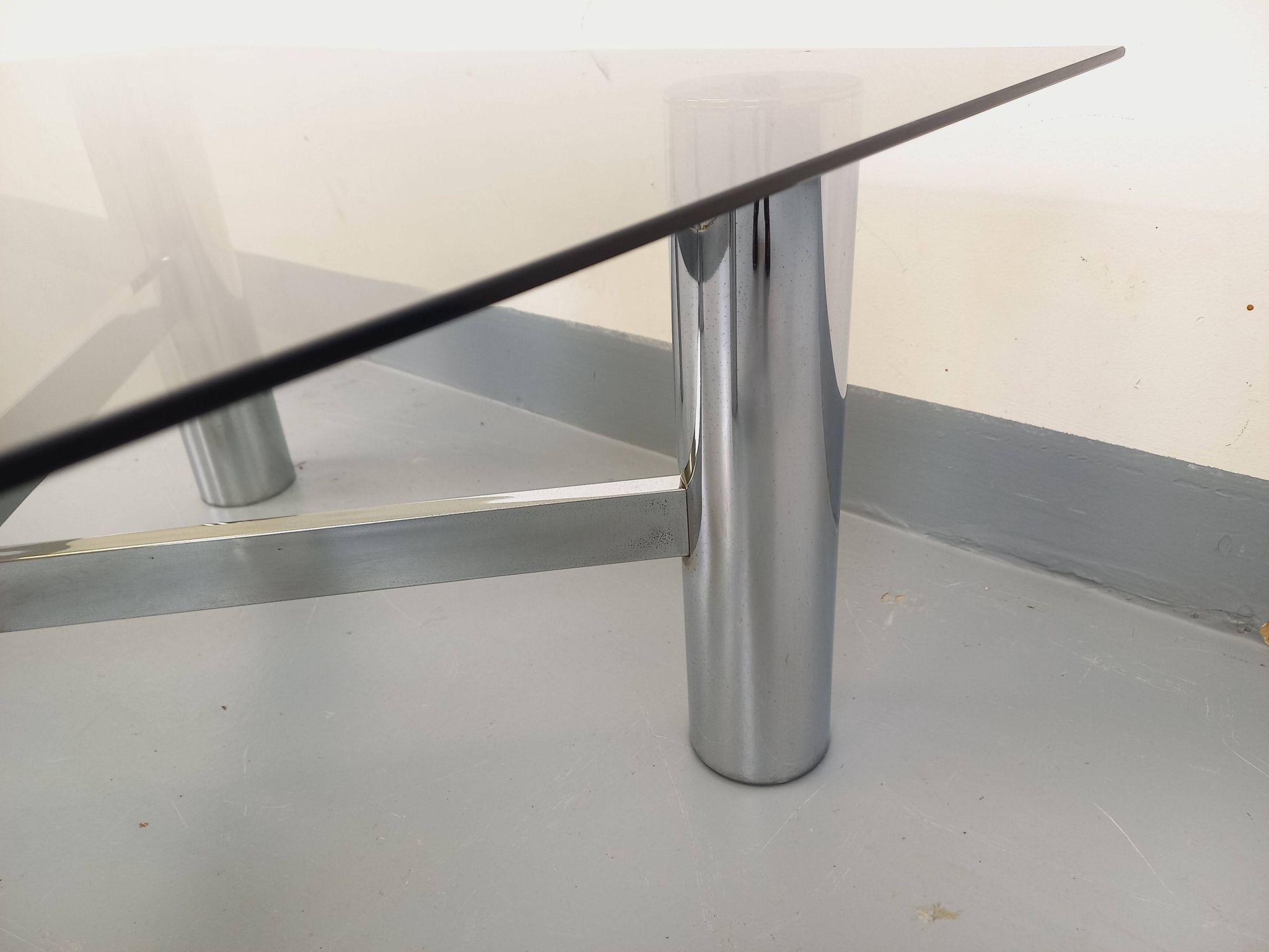 Square Italian vintage Space Age coffee table in smoked glass and metal.