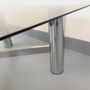 Square Italian vintage Space Age coffee table in smoked glass and metal.