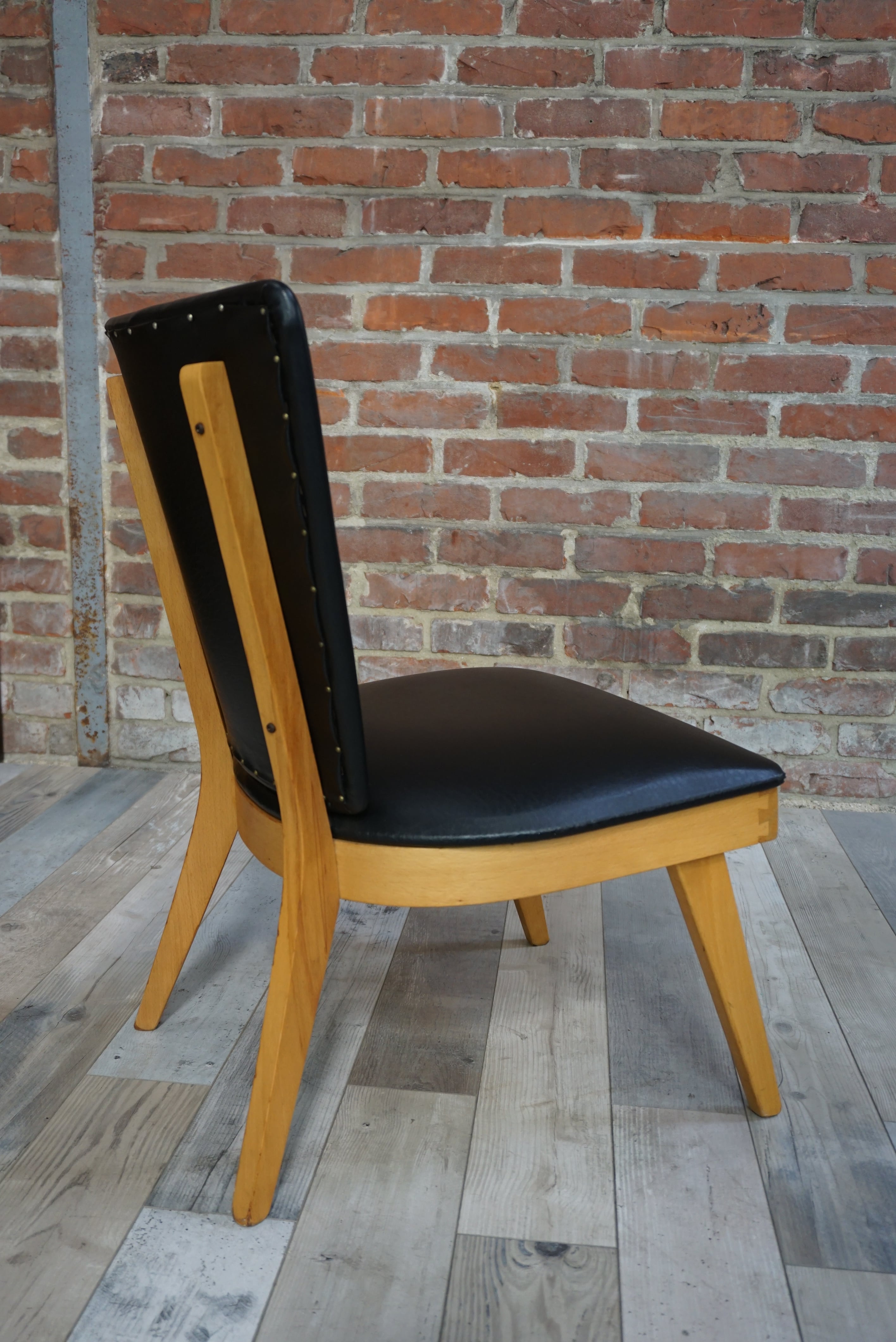 Chair 50 years in wood and faux black leather cocktail