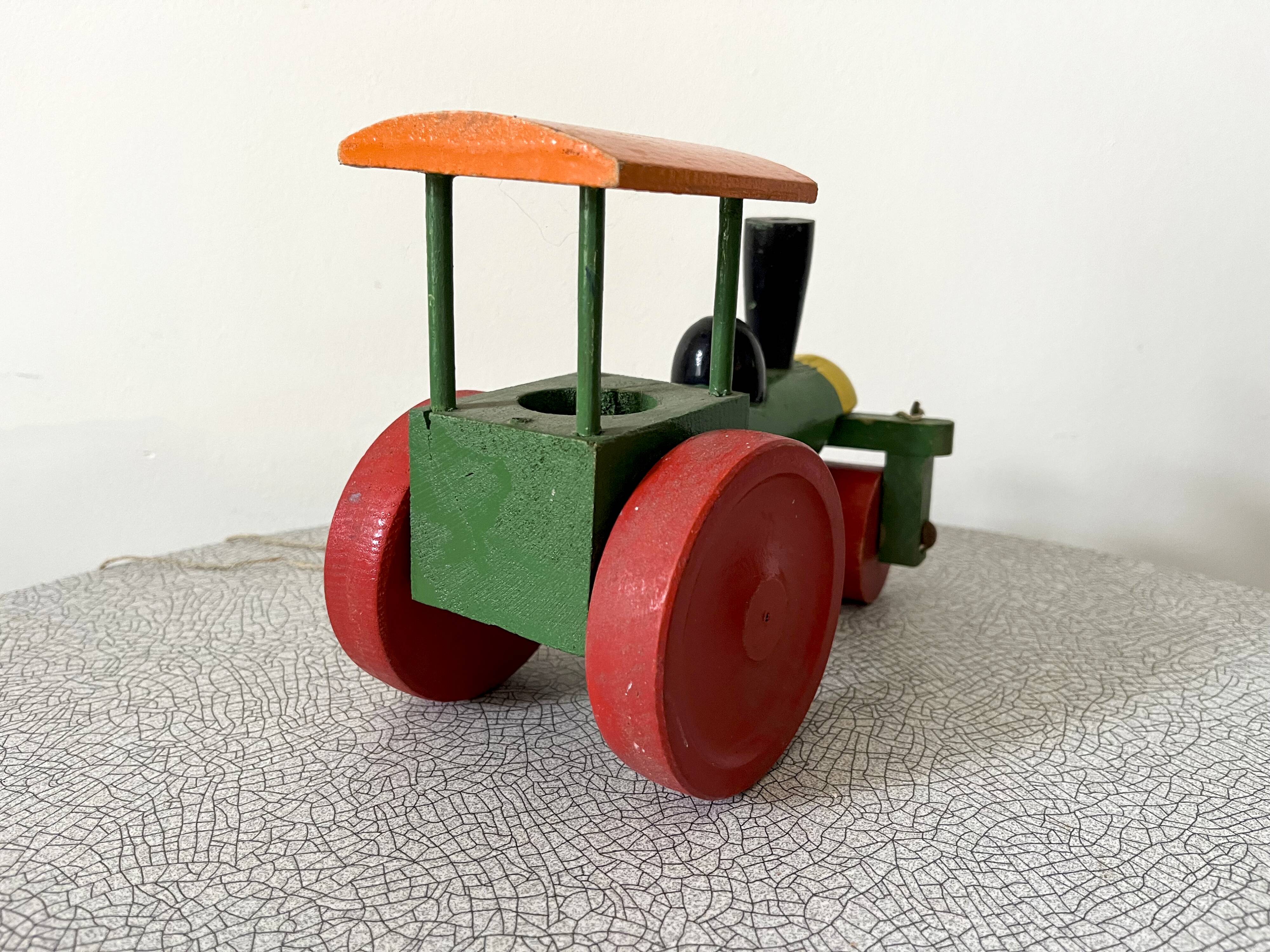 Wooden road roller tractor