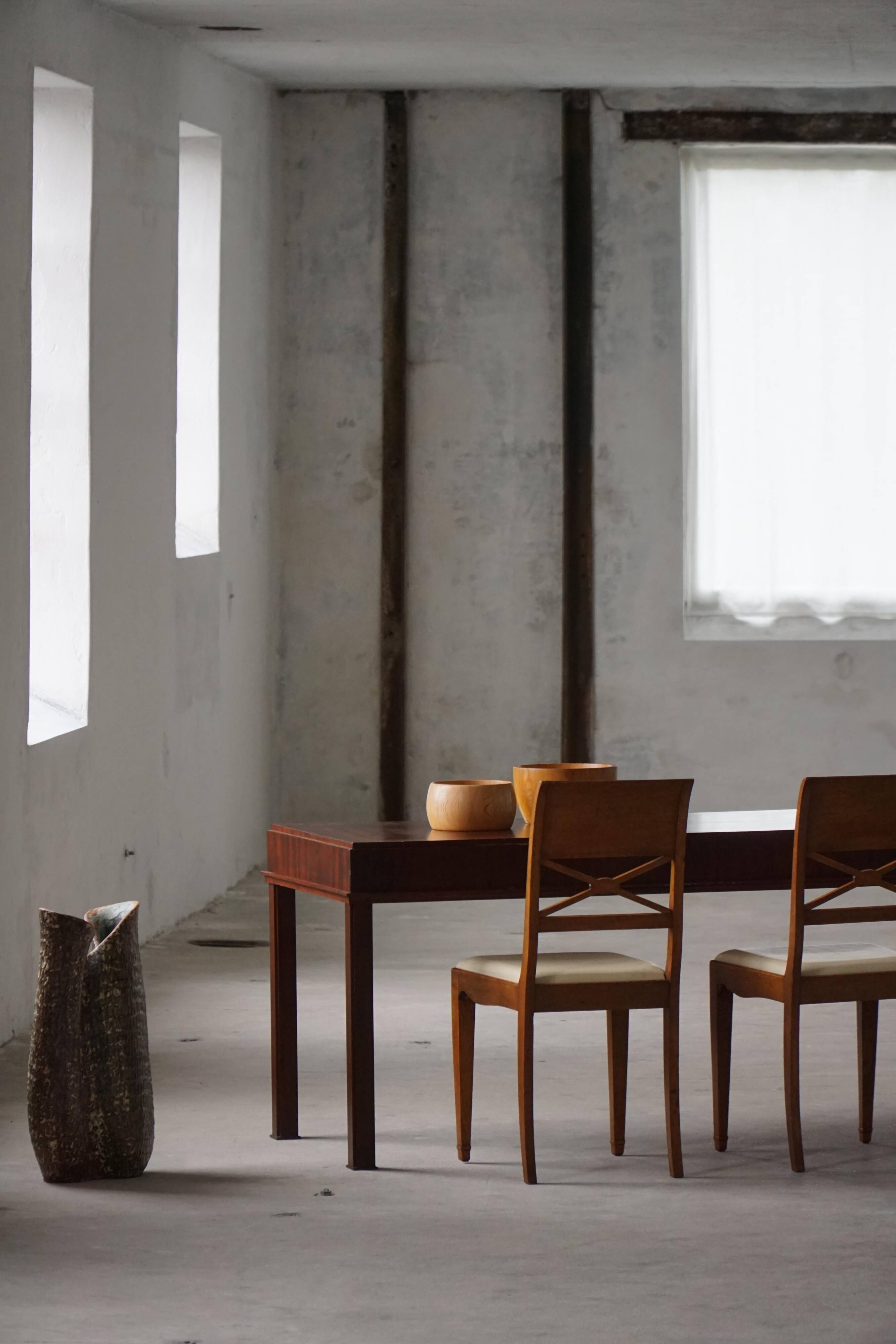 Mid-20th century mahogany writing desk by a Danish cabinetmaker, 1950s.