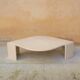 Table basse vintage en travertin par les éditions Roche Bobois