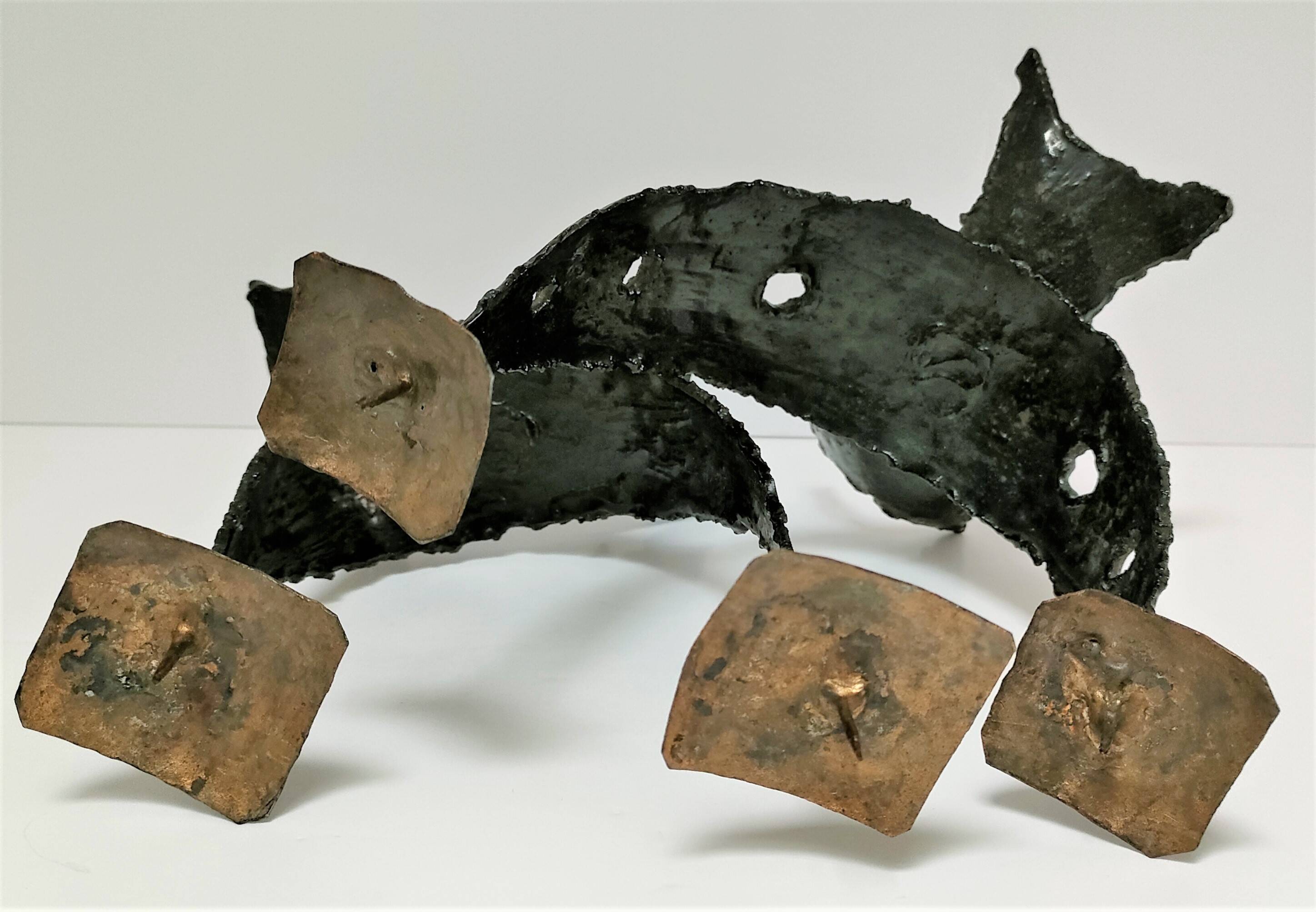 Pair of brutalist design metal candlesticks