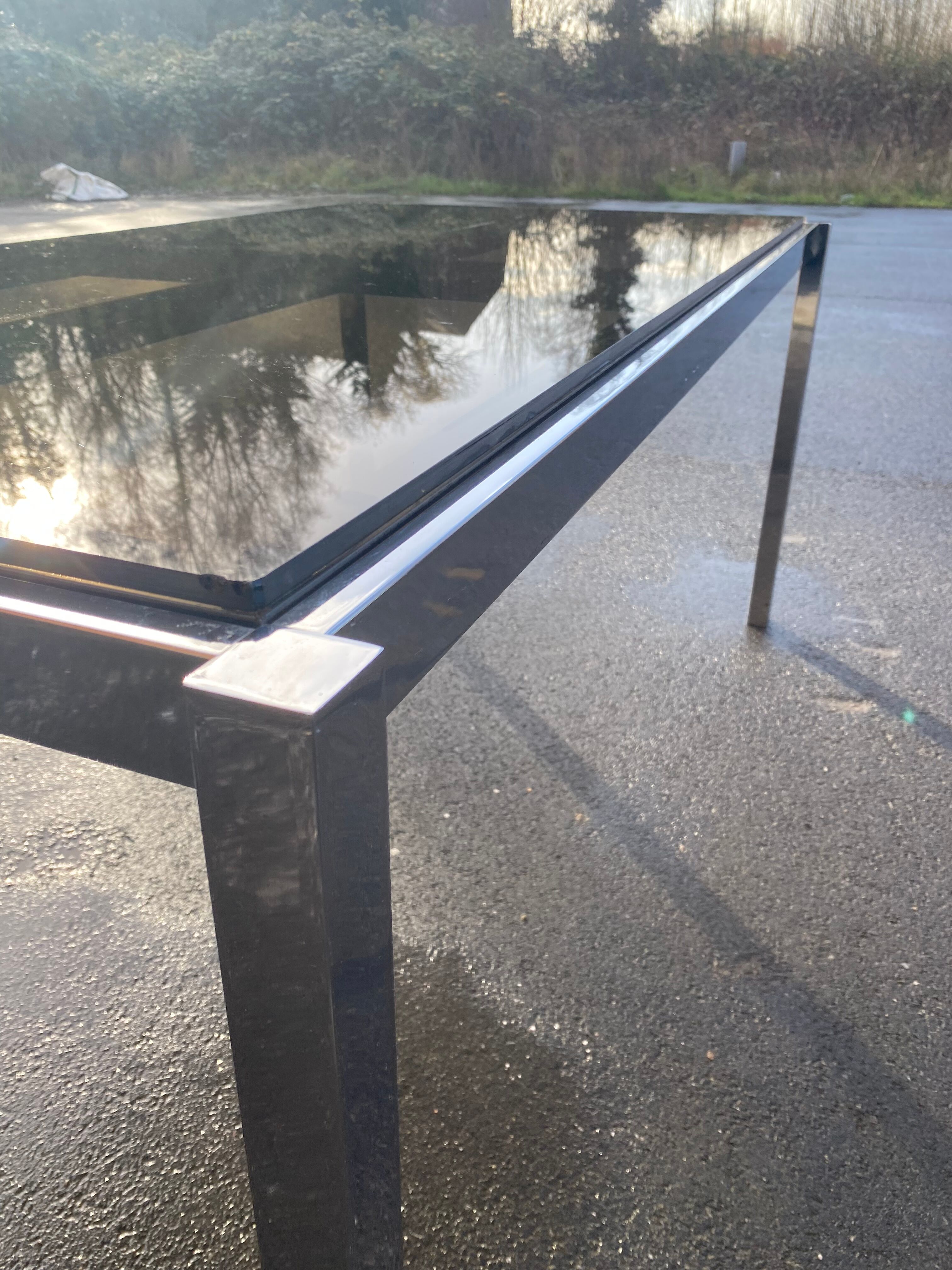Dining table in unemployment and smoked glass 70'