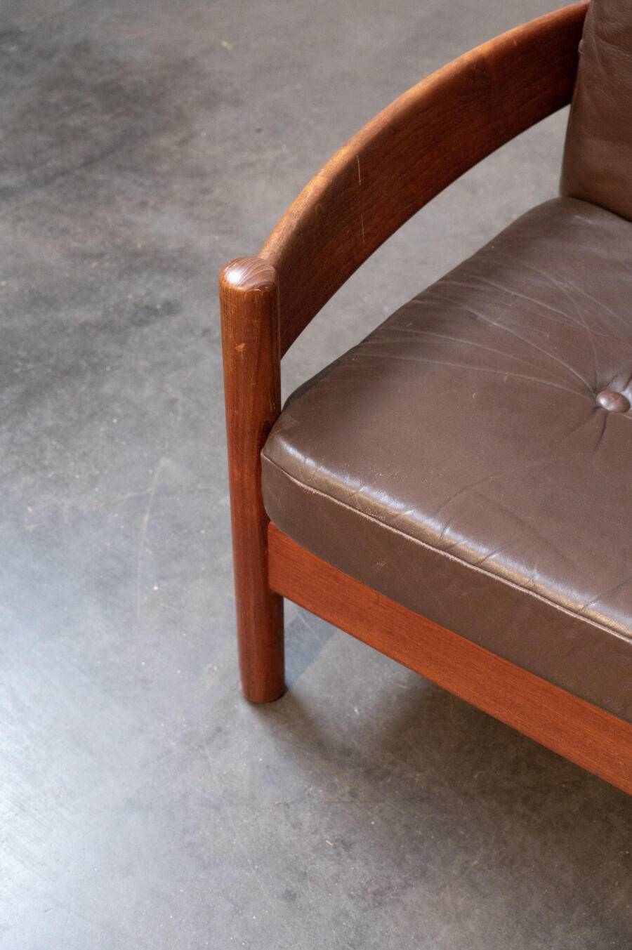 Teak and leather armchair