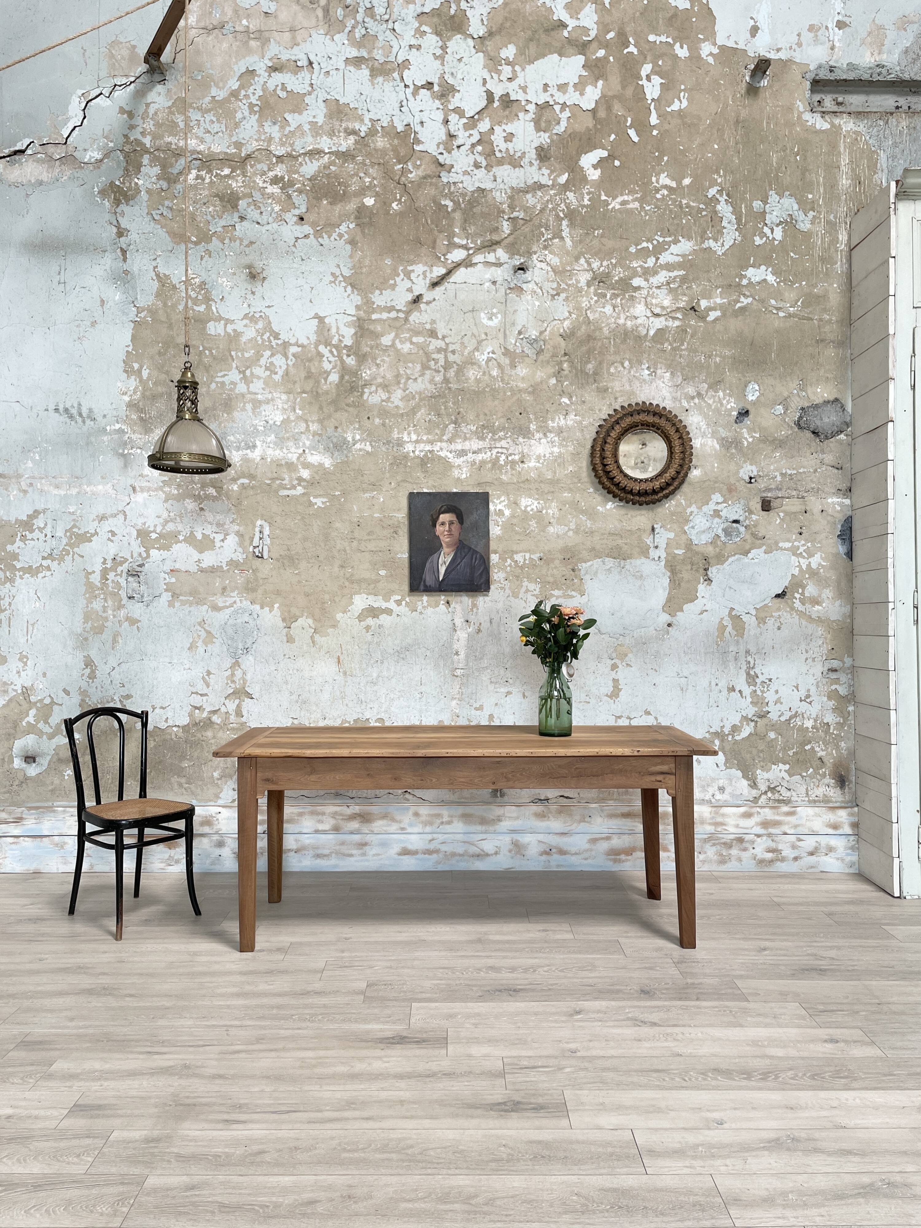 Vintage farmhouse table with spindle legs.