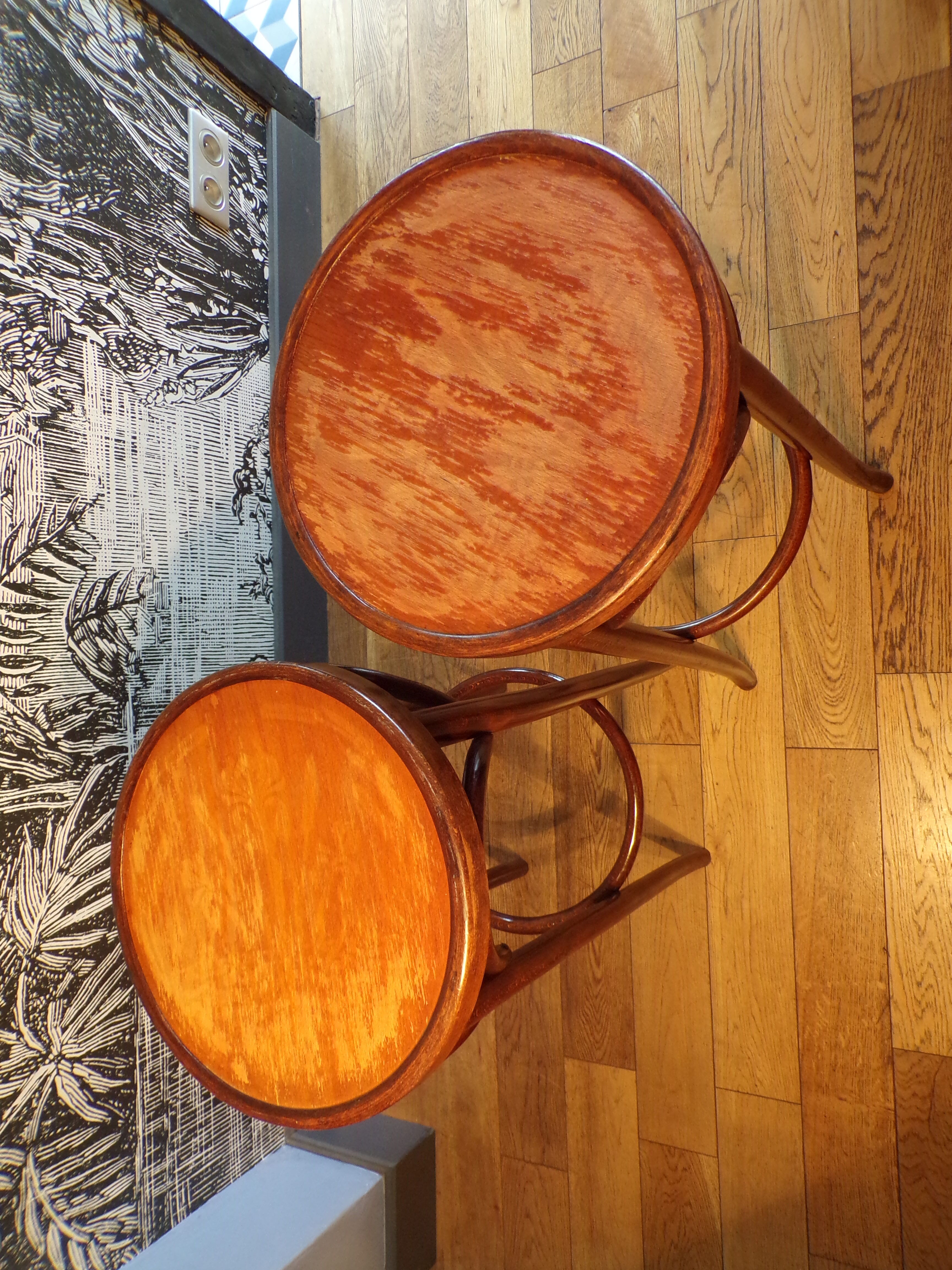 2 curved wooden bar stools