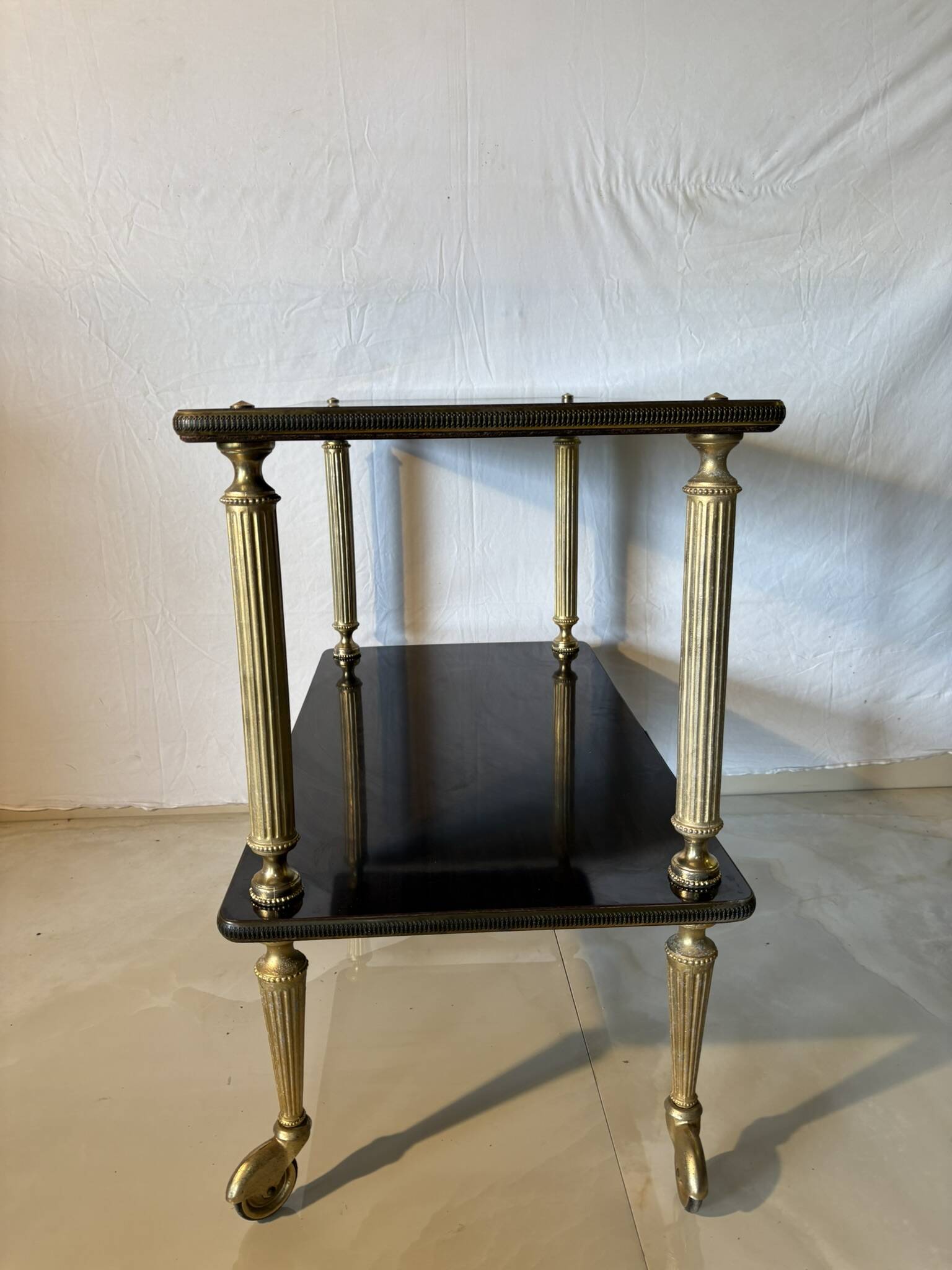 Vintage trolley on wheels, black wood and brass uprights